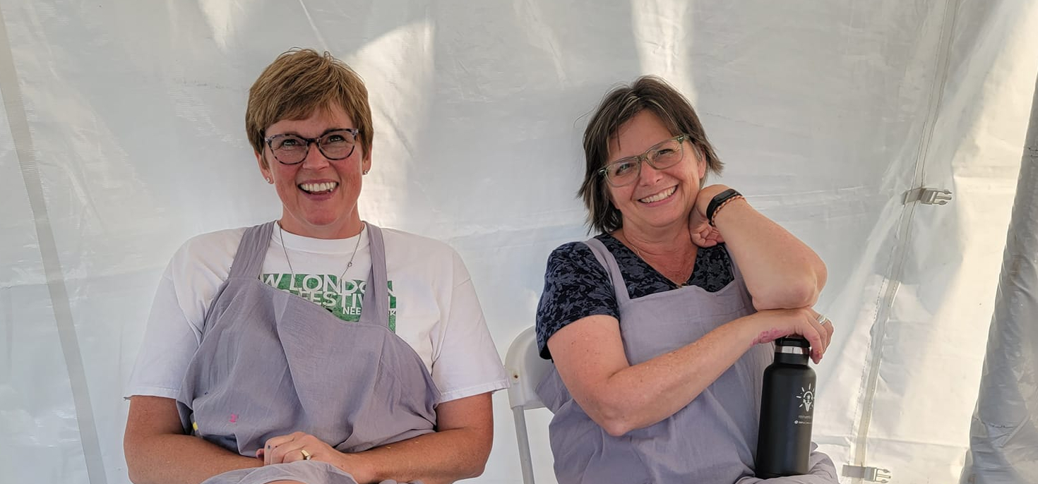 two artists taking a break in the middle of a project